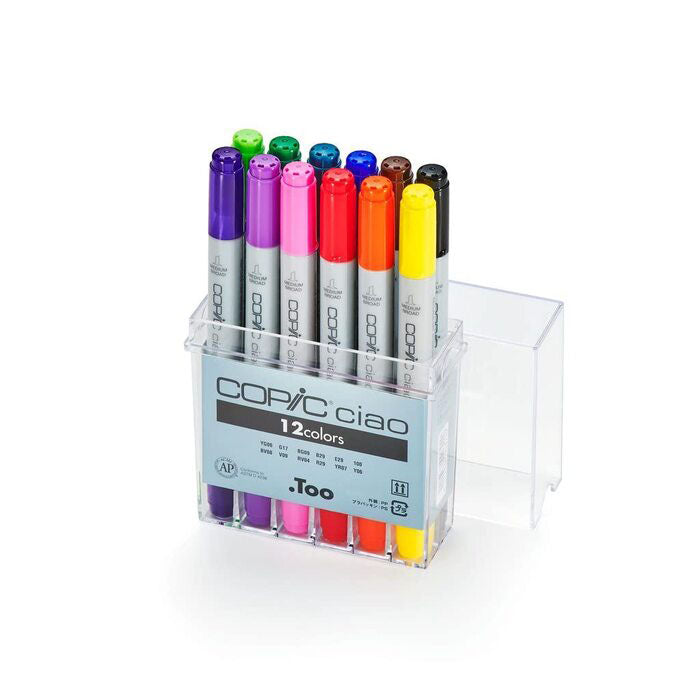 Colorful markers in transparent box.