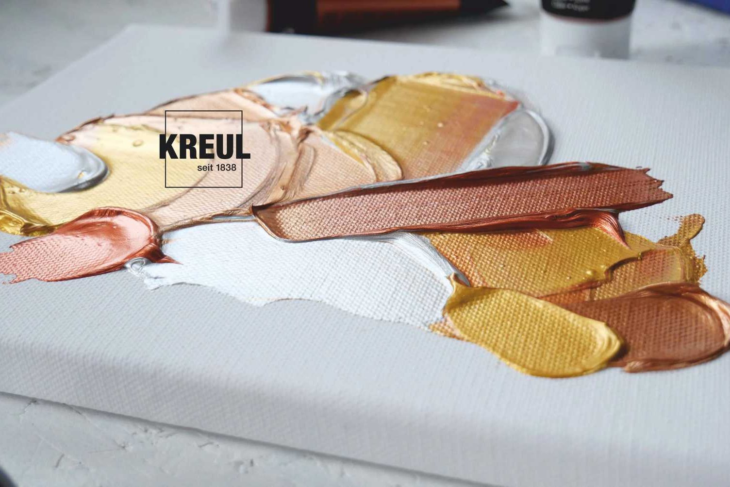 Gold metallic KREUL el Greco acrylic paint squeezed onto canvas