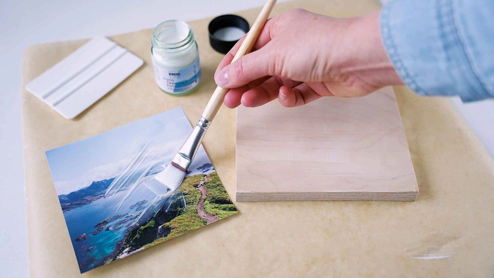 Sealing transferred photo on wooden panel with KREUL Foto Transfer Potch varnish