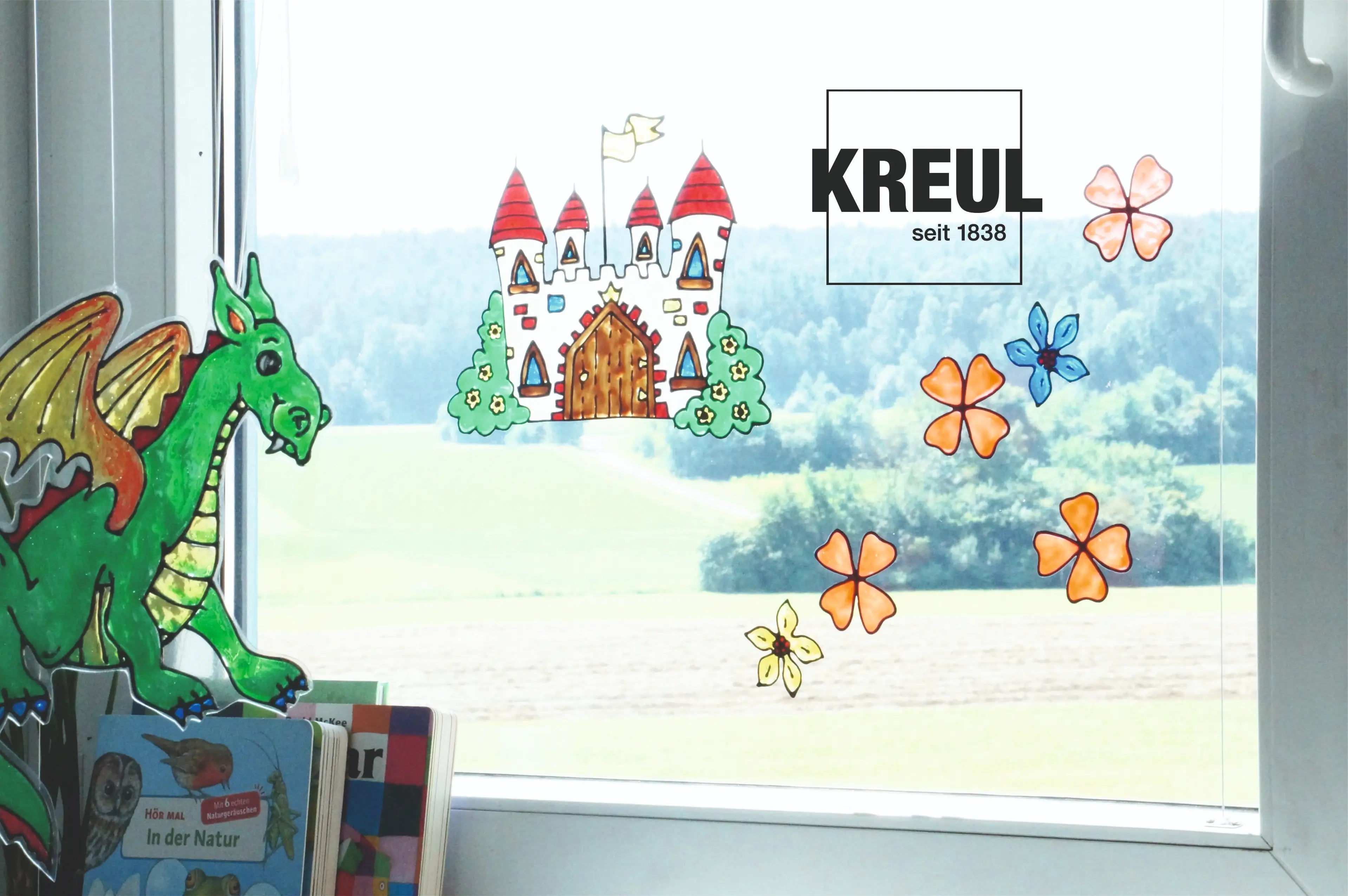 Green dragon window stickers created with KREUL Window Color Powerpack Castle