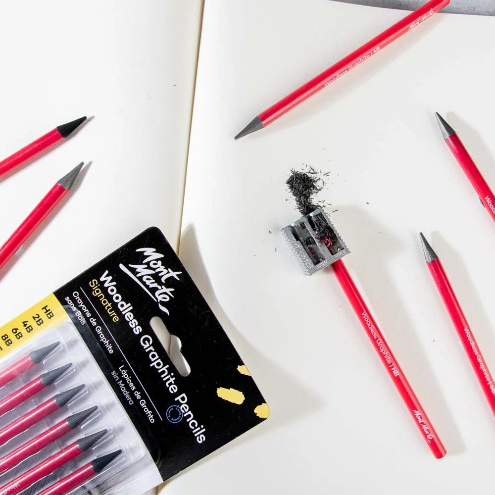 Sharpening Mont Marte Woodless Graphite Pencil with Blade