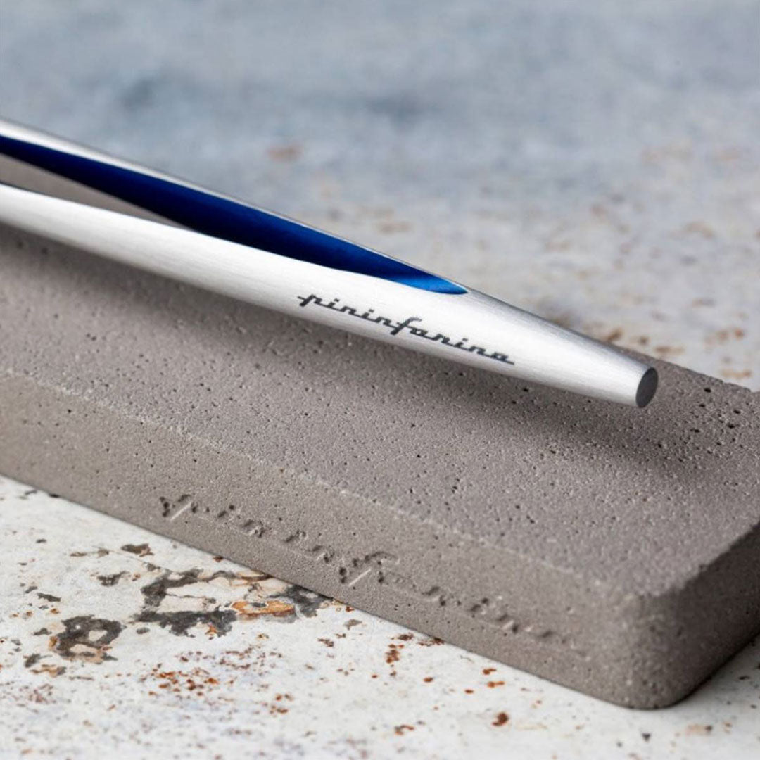 Pininfarina | Aero Blue Pencil | Ethergraf® metal alloy tip  | Raw Concrete Desk Stand Pininfarina